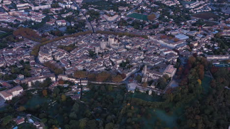 South-of-France-village-Uzès-from-above-global-aerial-view-trees-surrounding